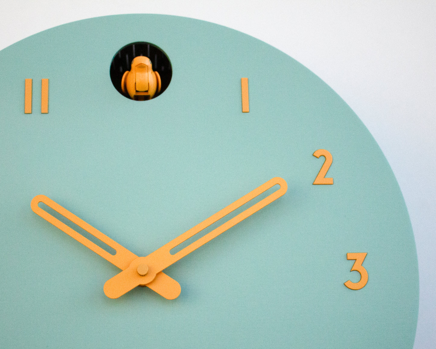 Modern Cuckoo Wall Clock – Mold Green & Amber Scandinavian Design