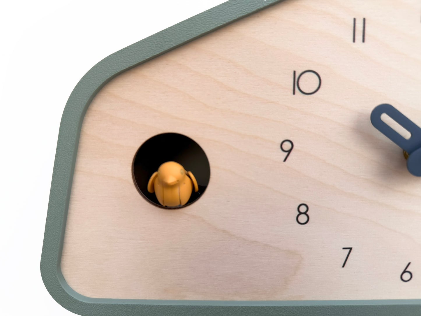 Modern Cuckoo Clock - Muted Green with Amber bird and Wind clock hands