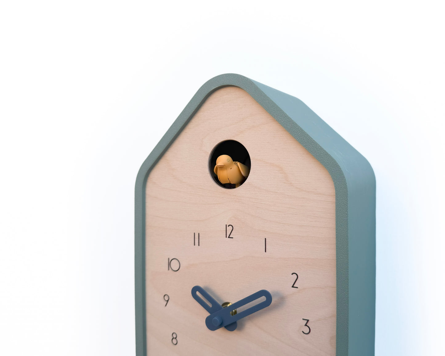 Modern Cuckoo Clock - Muted Green with Amber bird and Wind clock hands