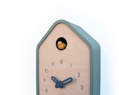 Modern Cuckoo Clock - Muted Green with Amber bird and Wind clock hands