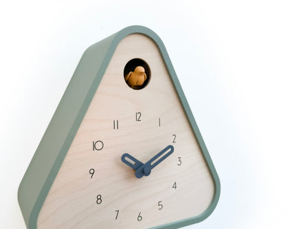 Modern Cuckoo Clock - Muted Green with Amber bird and Wind clock hands
