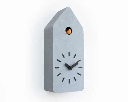 Cuckoo Clock - Concrete coated with black accessories and amber bird