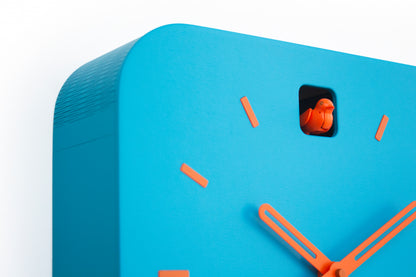 Bright Turquoise Cuckoo Clock with Orange Details, Playful Modern Home Decor